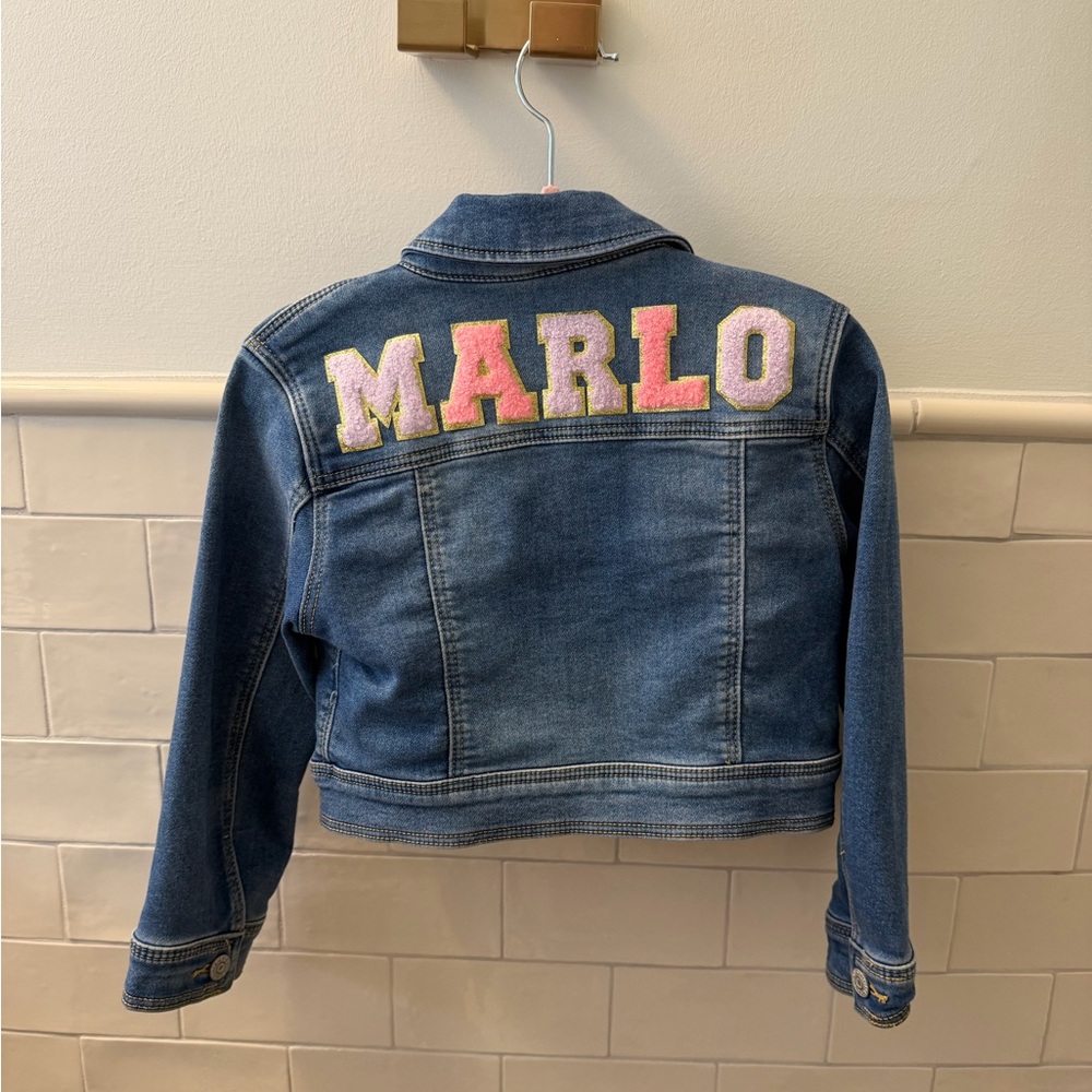 Denim jacket with “MARLO”
